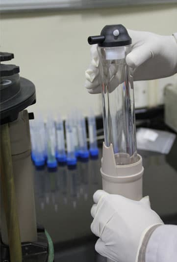Digestion-tube-being-inserted-into-protective-casing