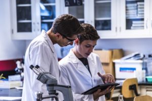 Career prospects for medical laboratory analysts in India 2 Lab Technicians at work