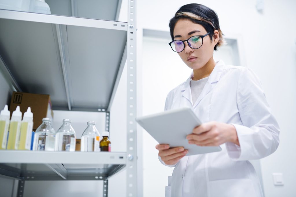 Lady working in medical storage room